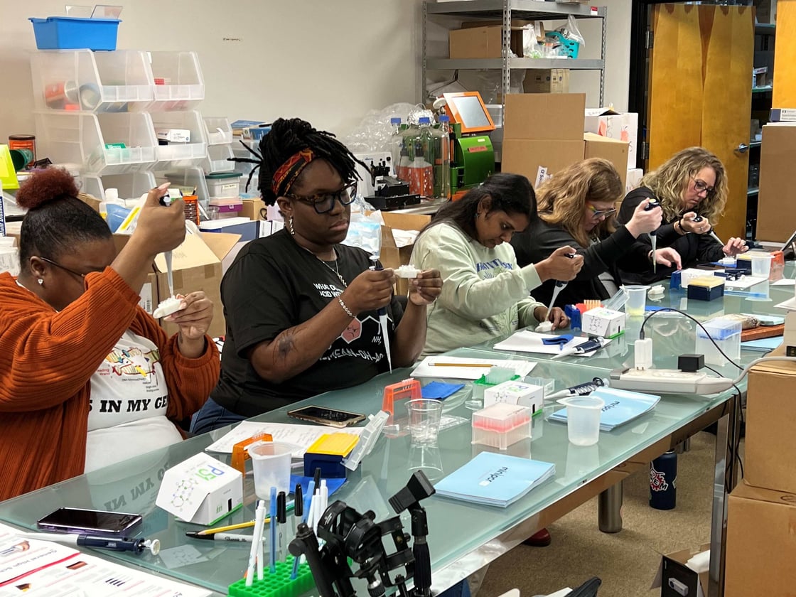 Teachers participate in a miniPCR workshop at the Equipment Depot